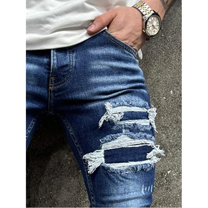 Blue skinny distressed jeans